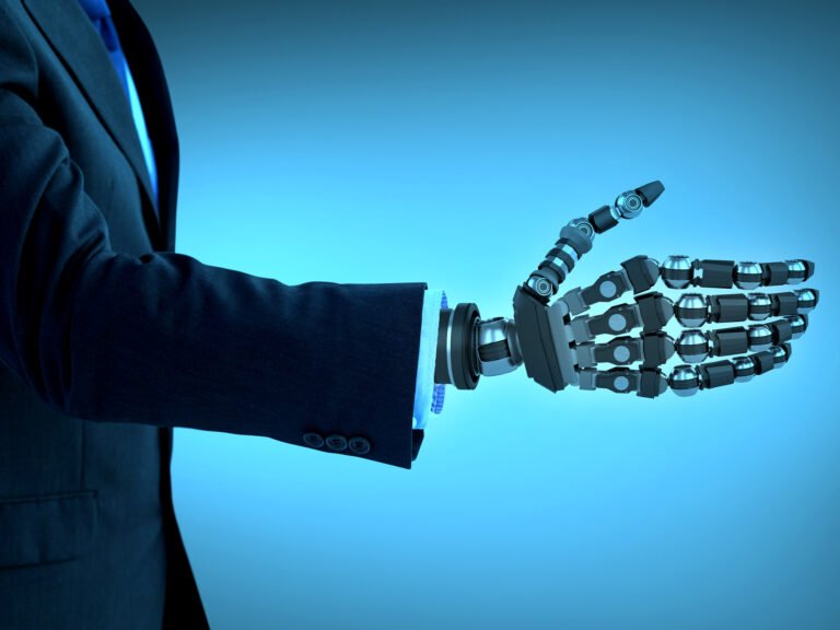 A robot arm offers a handshake